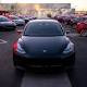Tesla surges as Wall Street bets on Model 3 