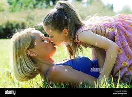 moter daughter oiss|Mother Daughter Kiss Stock Photo 6499594 | Shutterstock