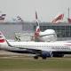 British Airways Parent IAG Cuts Earnings Outlook 
