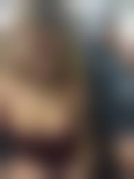 Hijab downblows|A woman wearing a purple hijab and a white shirt - SeaArt AI