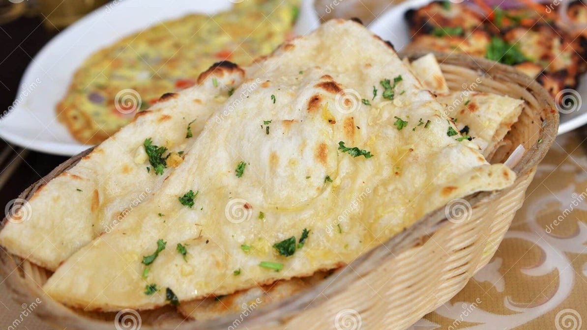 Thali Indian Cuisine by null