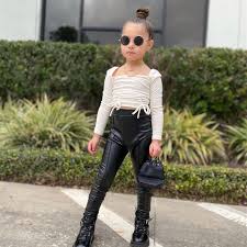 Leather outfit young girls|Beautiful young woman, model of fashion, in urban background. Girl wearing  leather clothes Stock Photo - Alamy