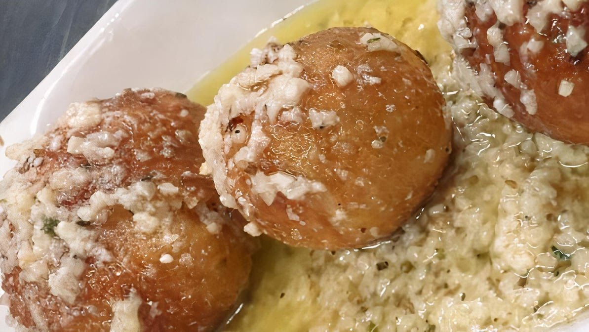 Tino's Pizza by null