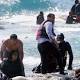 The Latest: Art Exhibit on Lampedusa Tackles Migrant Crisis 