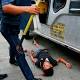 Philippine police van drives at protesters to break up anti-US demo 