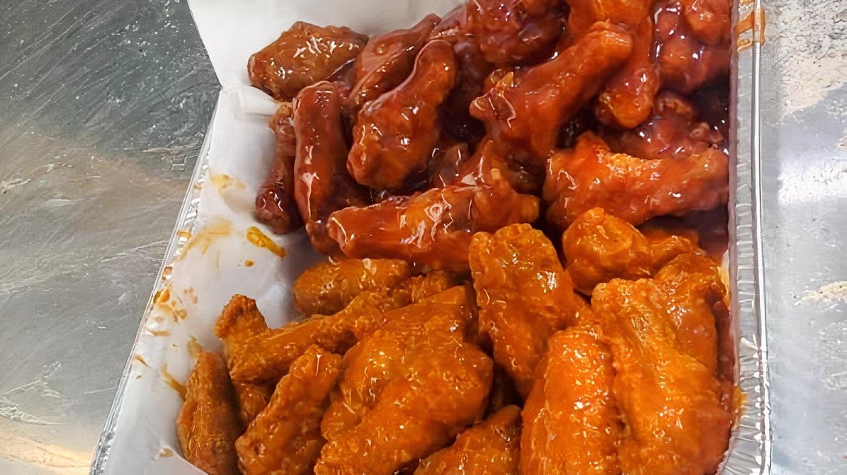 HOOKED CRISPY CHICKEN & FISH by null