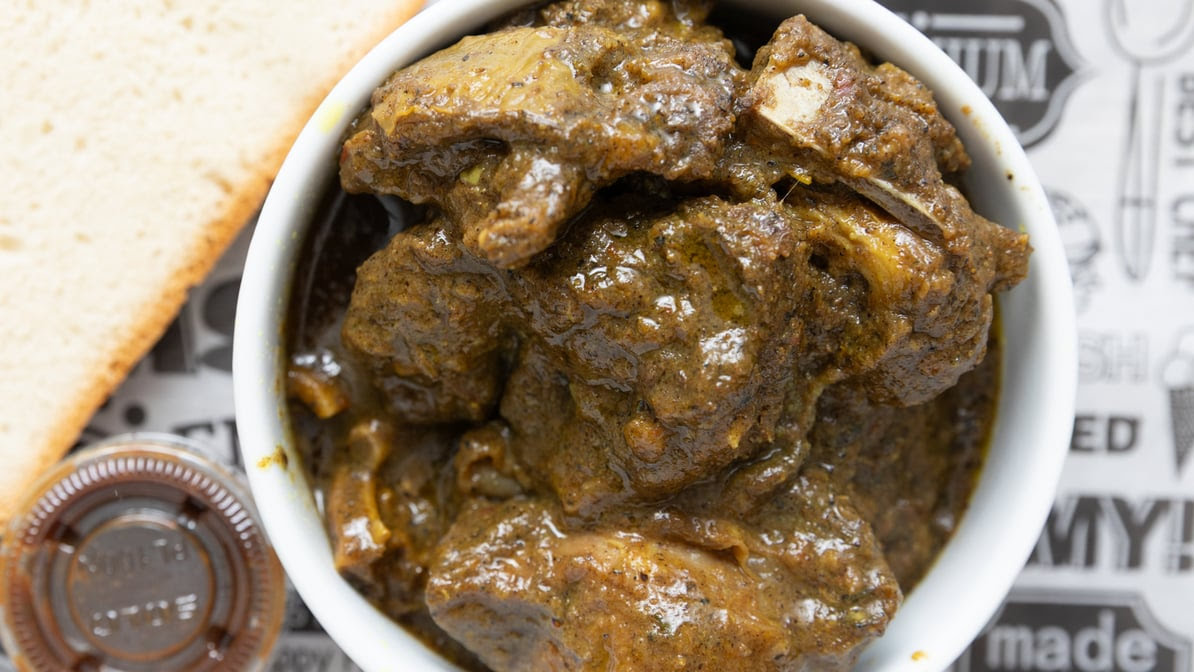 Jerk It Iz Jamaican Cuisine by null