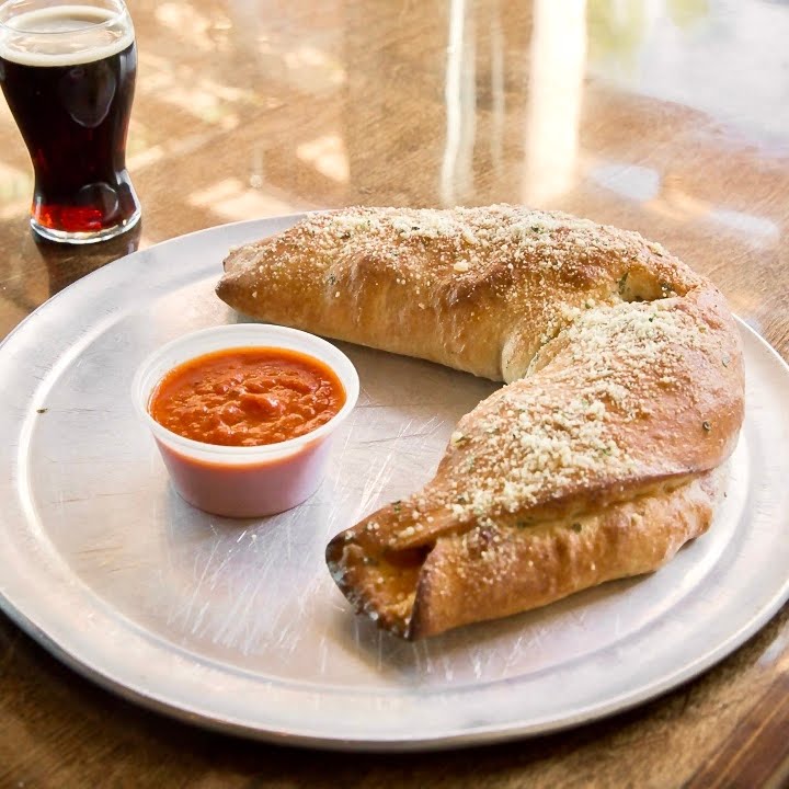 Fam's Brewing Co. featuring Famulari's Pizzeria by null