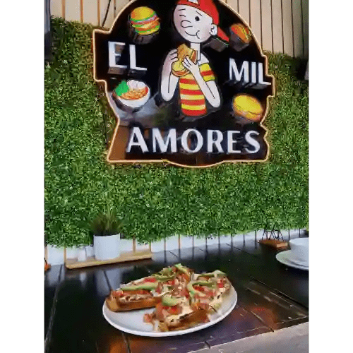 EL MIL AMORES by null