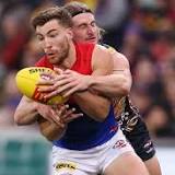 Dees steady after late Crows scare to go game clear on top of AFL ladder