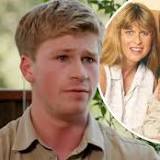 Robert Irwin chokes back tears as he praises his 'wonder woman' mother Terri for her 'bravery' as she continues to ...