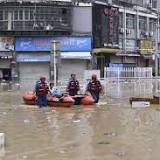 Heavy rain floods south China - authorities open floodgates without warning those downstream.