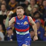 AFL forward Lewis re-signs with Hawthorn