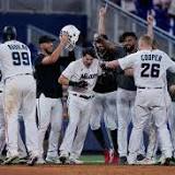 Marlins beat Pirates on walk-off triple in 11th inning