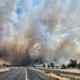 Small WA town grieves after fast-moving wildfire levels six homes