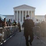 Abortion Rights Protester Locks Neck to US Supreme Court Fence