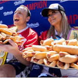 Chowdown: He ate 63 hot dogs in 10 minutes, she ate 40