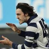 Irish duo help Geelong win top of the table AFL clash against champions Melbourne