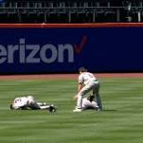 Astros' Yordan Alvarez carted off field after collision with Jeremy Peña