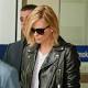 Charlize Theron arrives solo in Melbourne wearing black moto leather jacket as ... 