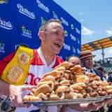 Joey Chestnut puts protester in a chokehold and still wins hot dog contest again